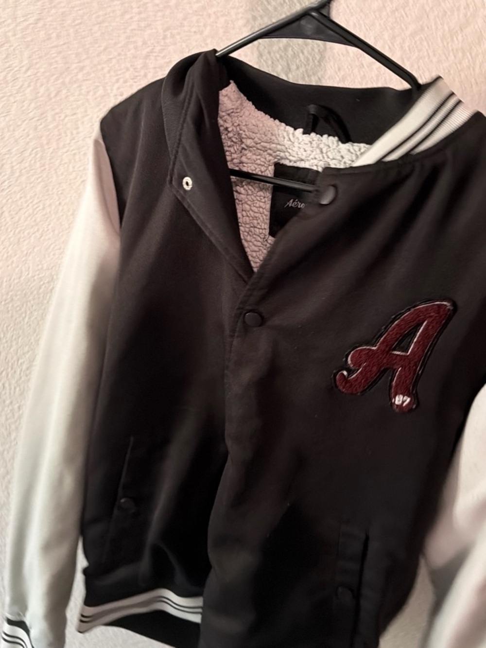 Aeropostale Black and White Varsity Jacket with Maroon Patch